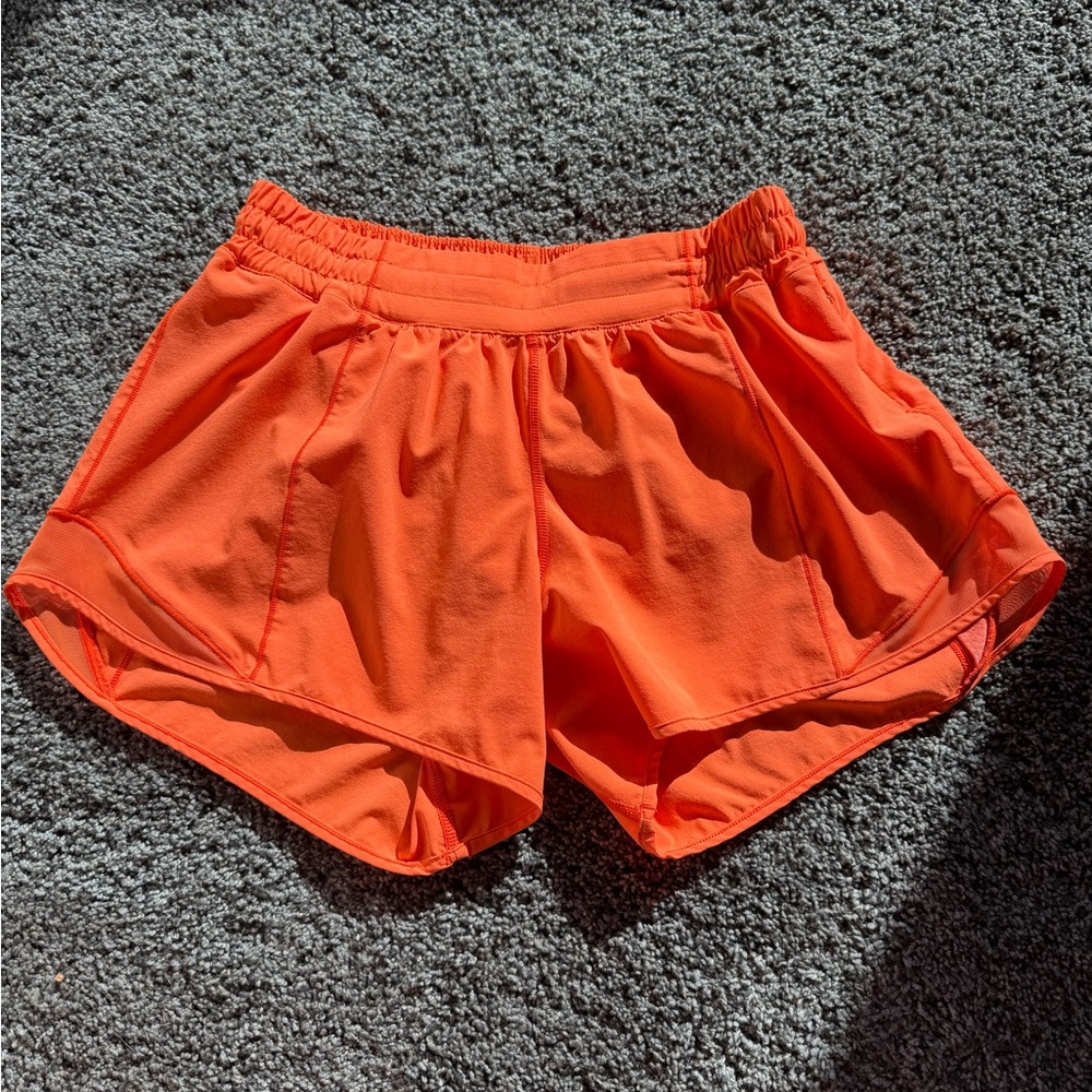 Rare neon orange size 8 lululemon hotty hot 4 inch shorts!